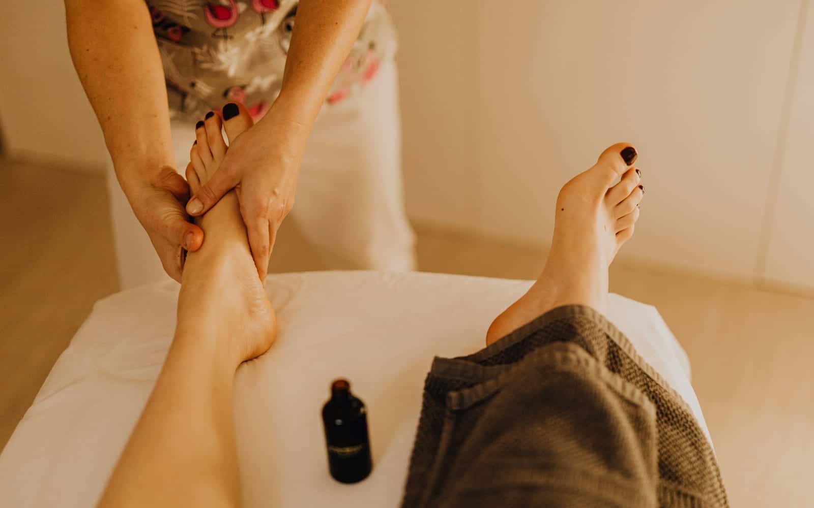 A foot massage with warm oil
