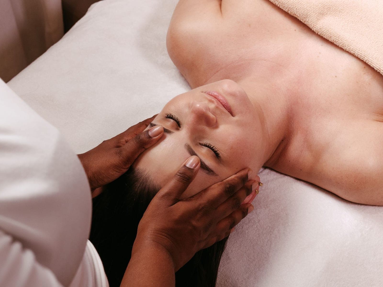 A client receiving an Indian head massage