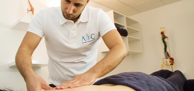 Abdul Abu-Laban treating a patient at Aberdeen Osteopathy & Massage Clinic